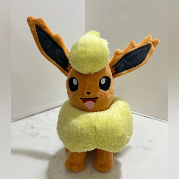 Pokemon Other - Big Pokemon Fluffy Yellow and Brown Plush Toy. Used excellent conditions.